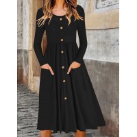 فستان أنيق بلون سادة بأزرار وتفاصيل رقبة مستديرة وأكمام طويلة متوسطة الطول